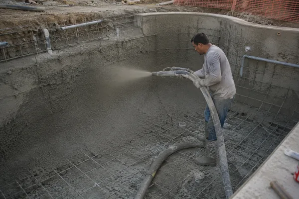 Shotcrete pool shell curing under ideal conditions