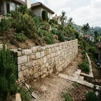 Durable stone retaining wall installation